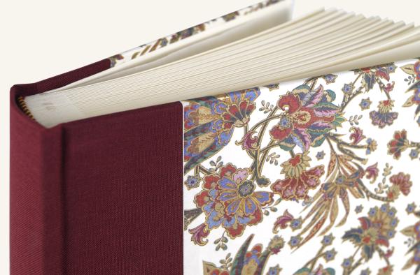 Photo album with bright pages and glassine interleaves